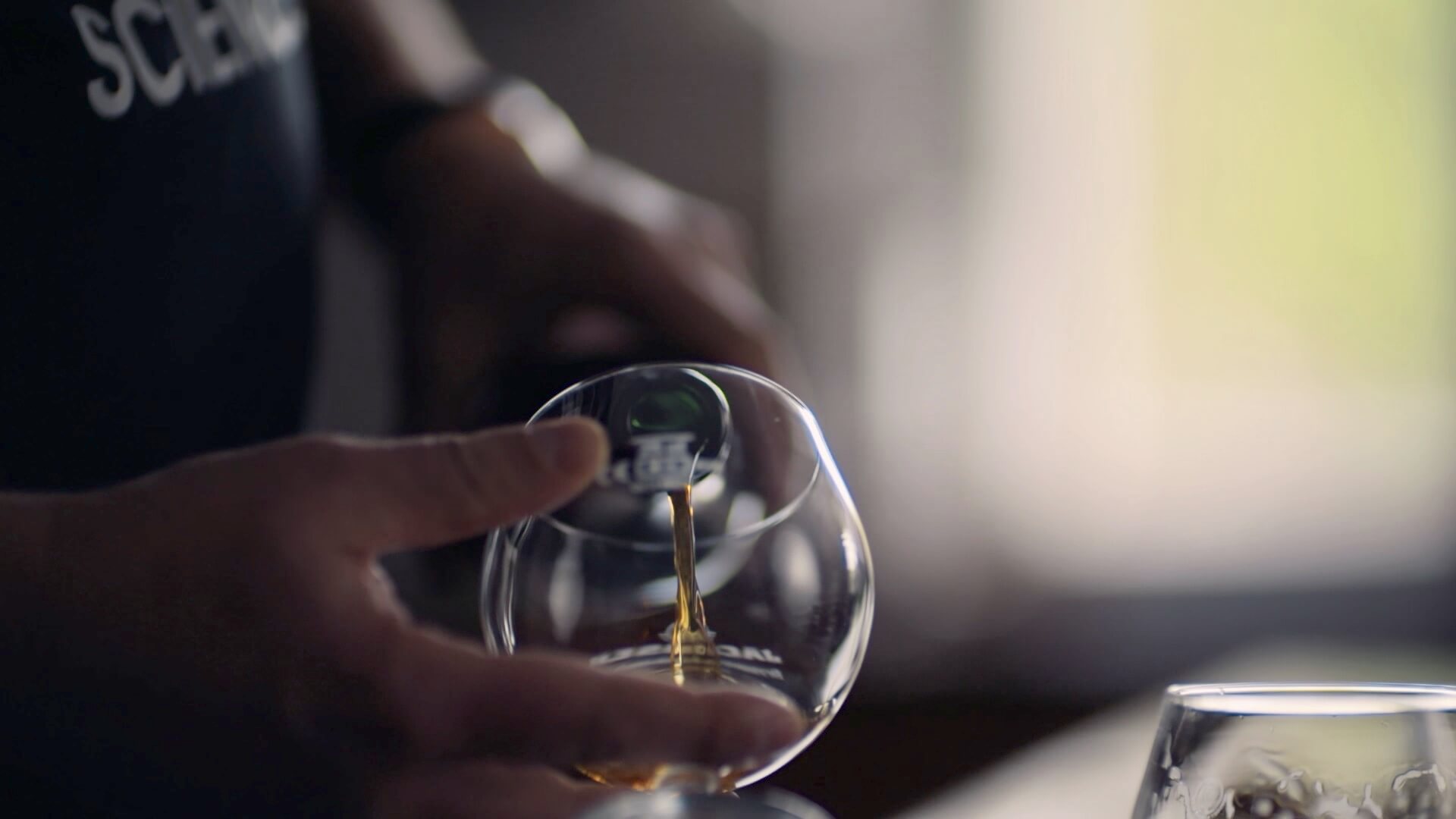 Zoran Gojkovic tasting beer in laboratory