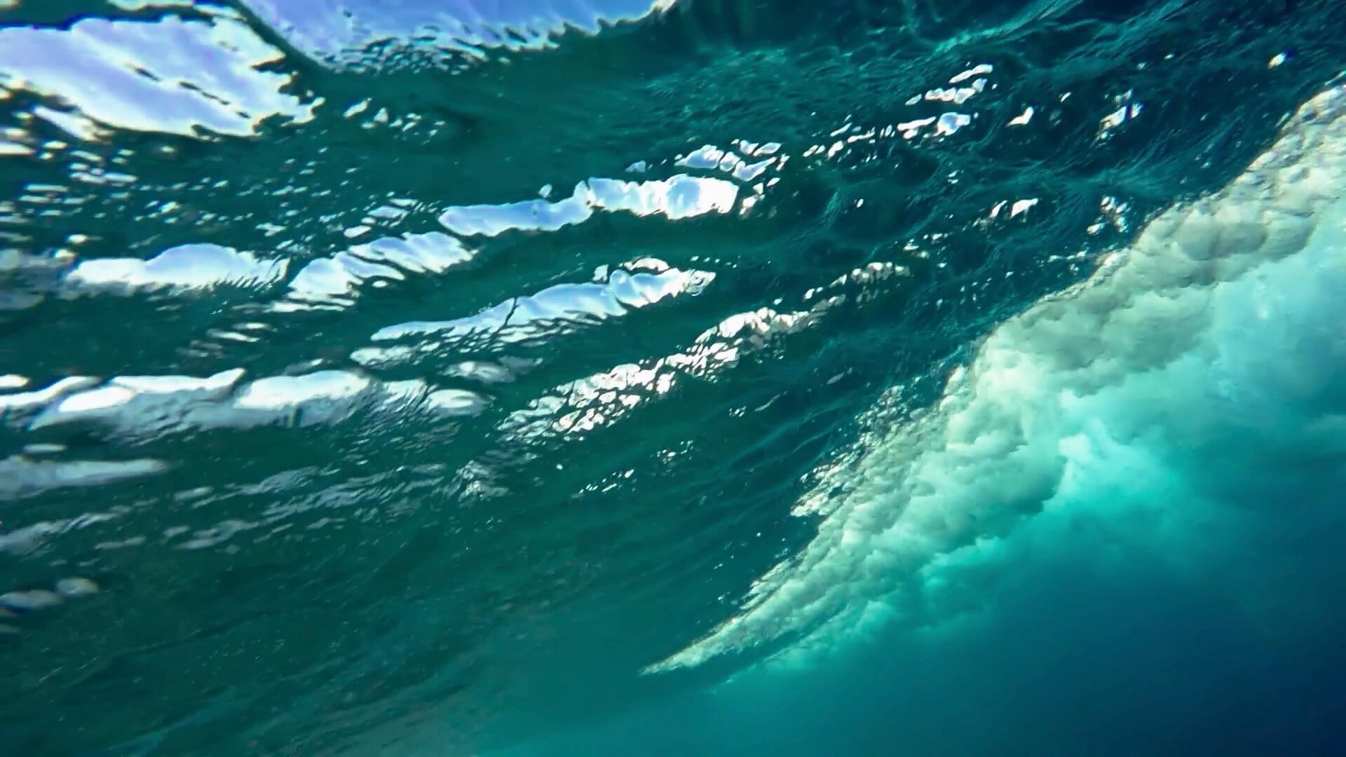 hero image blue ocean with bubbles from underwater